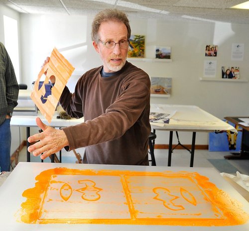 George Mason, artist in residence at Kismet Foundation, gives class in encaustic painting to artists. Gordon Chibroski/Staff Photographer